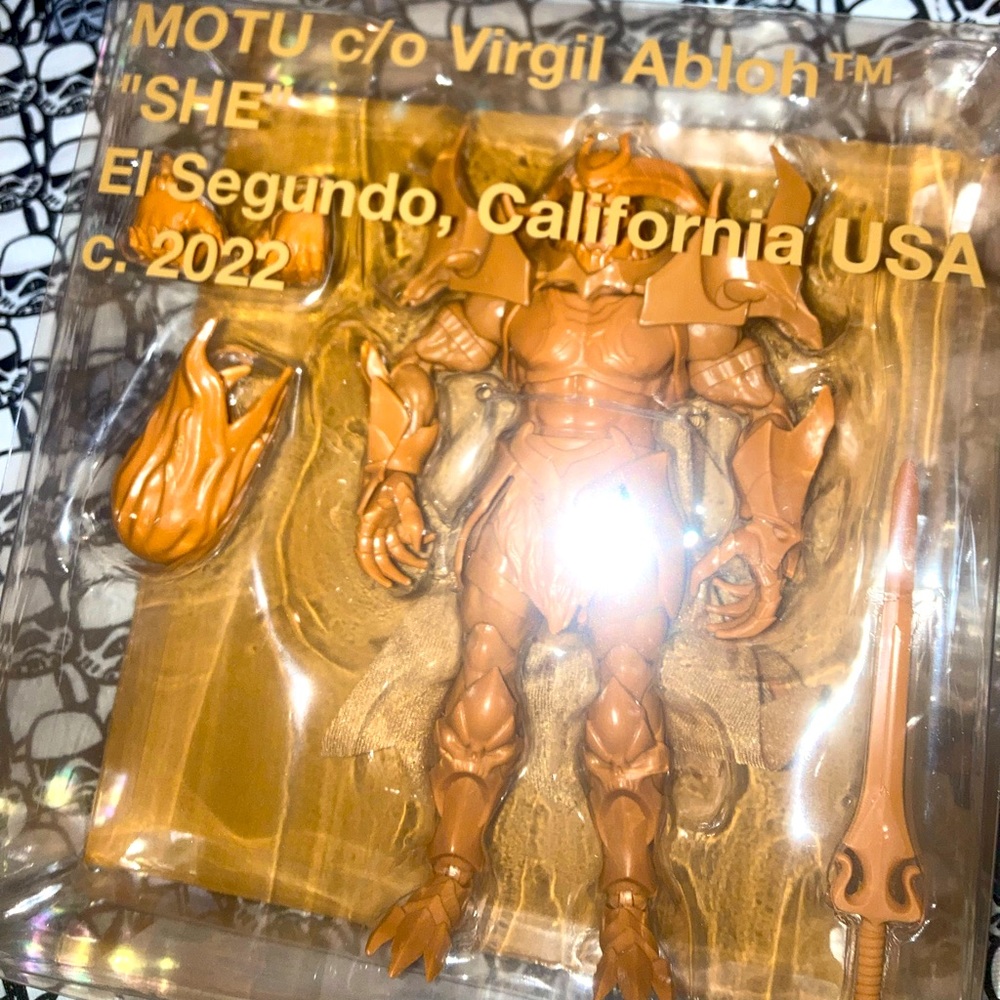 Off-white masters of the universe skelegod figure.